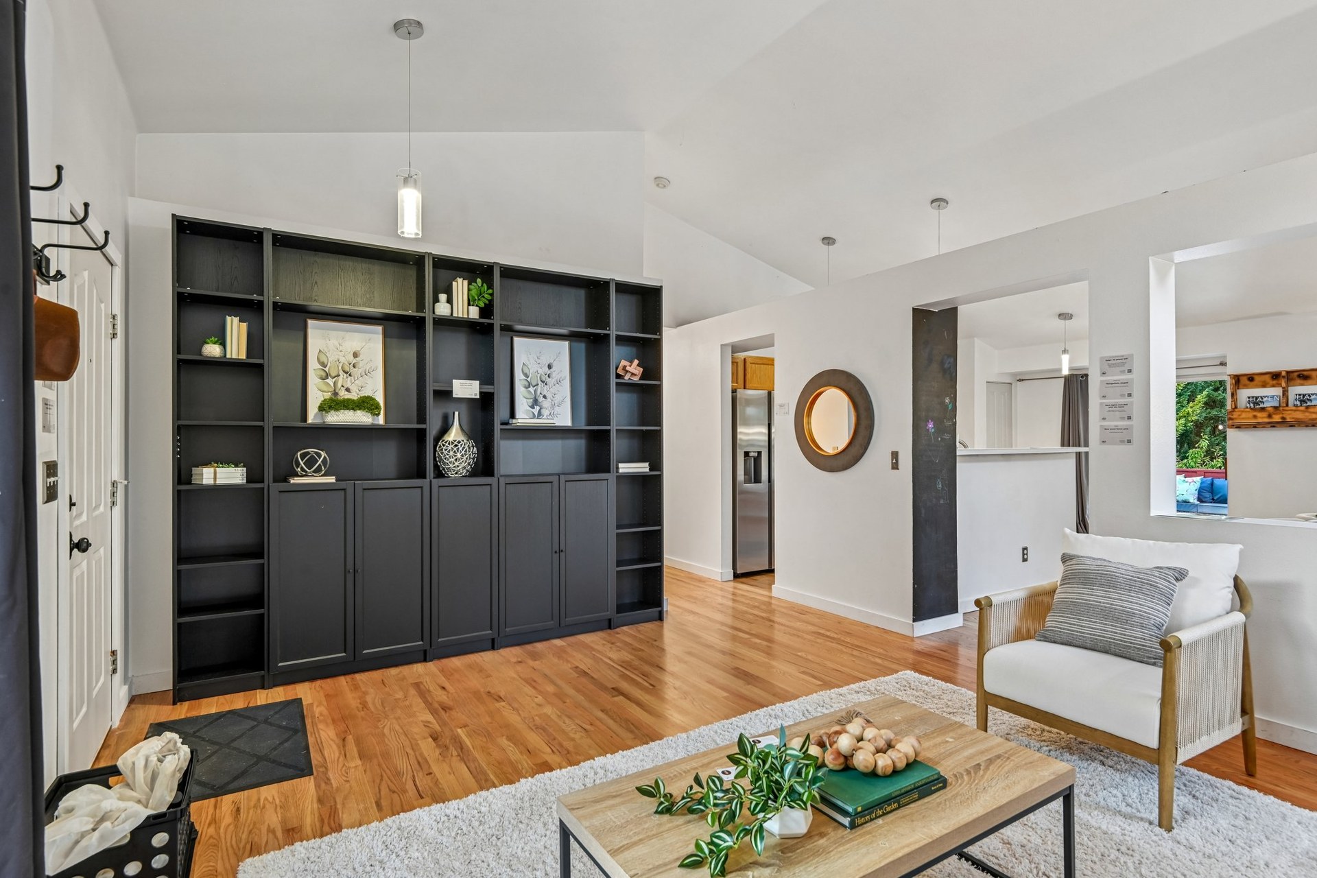 Living room bookcase and open layout at 27728 149th Pl SE
