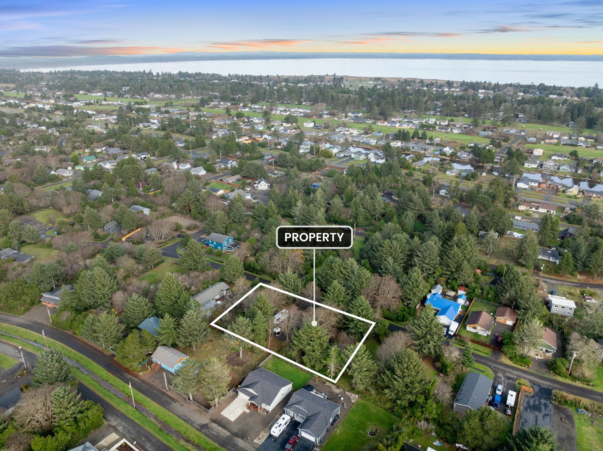 Neighborhood aerial with the property marked at 337 Mast Ave NW